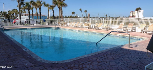 view of pool featuring a patio