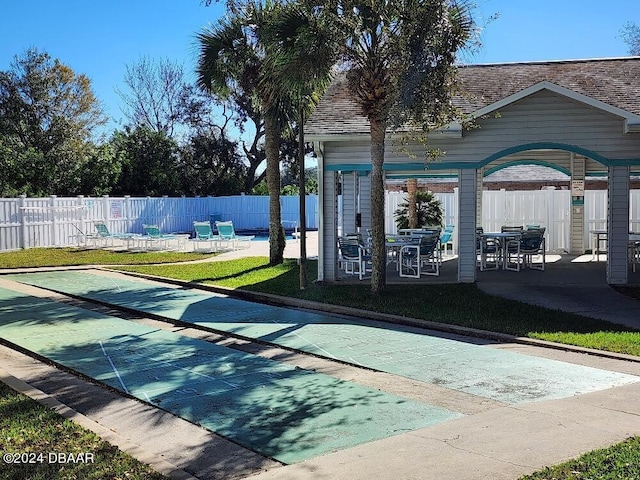 view of property's community featuring a patio