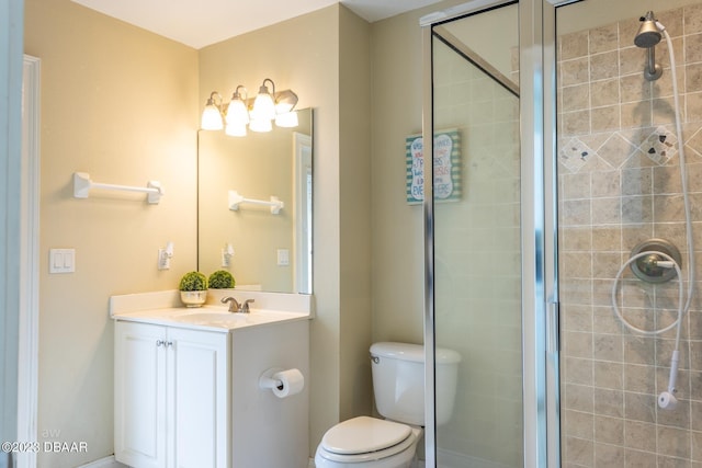 10 Foxhunter Flt, Ormond Beach, FL 32174 - bathroom featuring a shower stall, vanity, and toilet