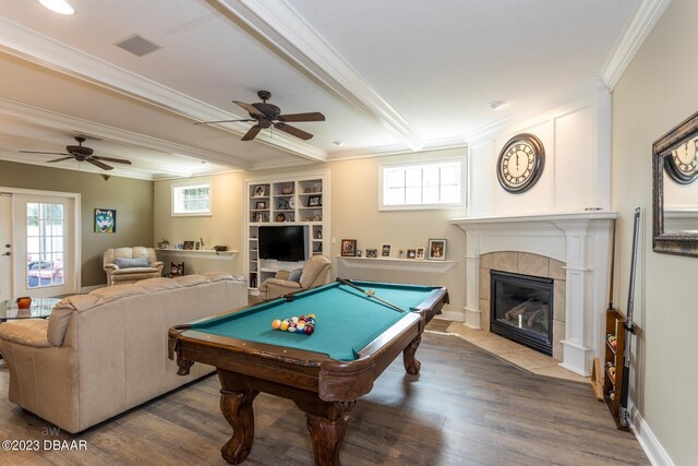 10 Foxhunter Flt, Ormond Beach, FL 32174 - recreation room featuring crown molding, beam ceiling, a ceiling fan, and wood finished floors