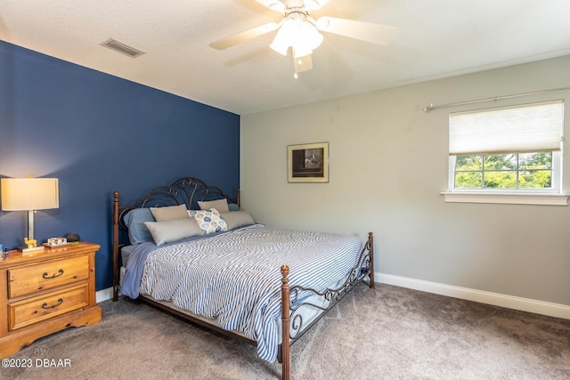 10 Foxhunter Flt, Ormond Beach, FL 32174 - carpeted bedroom with baseboards, ceiling fan, and visible vents
