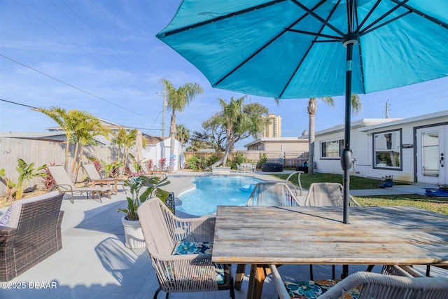 view of swimming pool featuring a patio