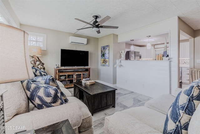 living room with ceiling fan and a wall mounted air conditioner