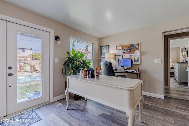 office space with hardwood / wood-style floors