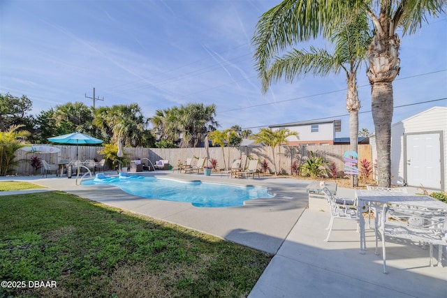 view of swimming pool with a patio