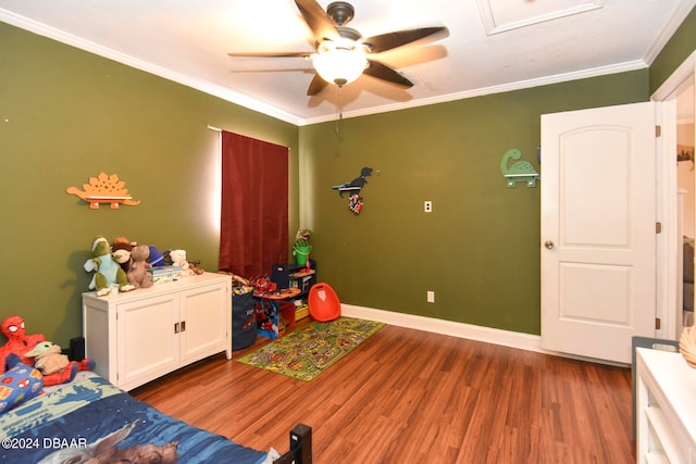 bedroom featuring wood-type flooring, ceiling fan, and crown molding