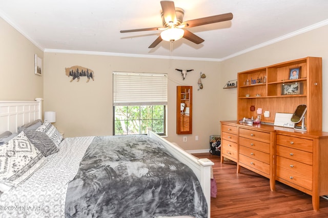 bedroom featuring ceiling fan, dark hardwood / wood-style flooring, and ornamental molding