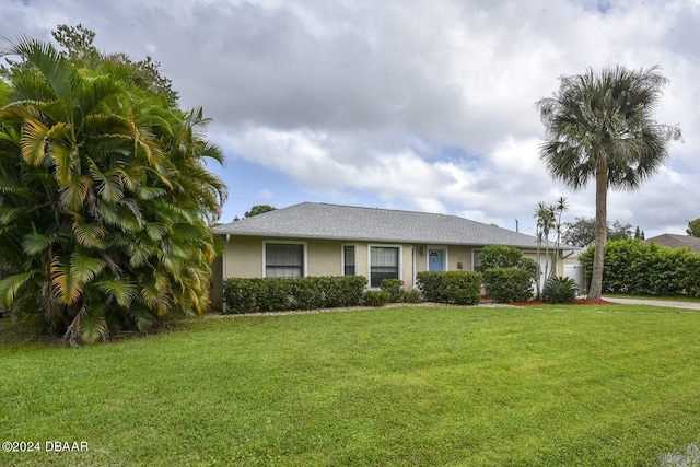 view of front of property with a front lawn