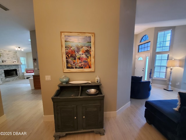 1941 Spruce Creek Lndg, Port Orange, FL 32128 - corridor featuring wood finished floors and lofted ceiling