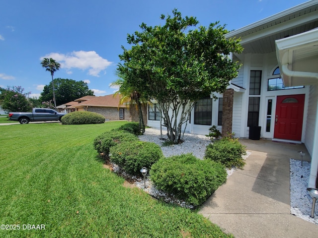 1941 Spruce Creek Lndg, Port Orange, FL 32128 - view of front of property featuring a front lawn