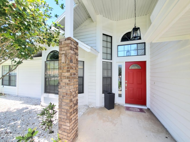 1941 Spruce Creek Lndg, Port Orange, FL 32128 - view of exterior entry featuring covered porch