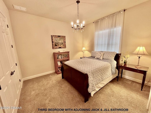 carpeted bedroom featuring an inviting chandelier and a textured ceiling