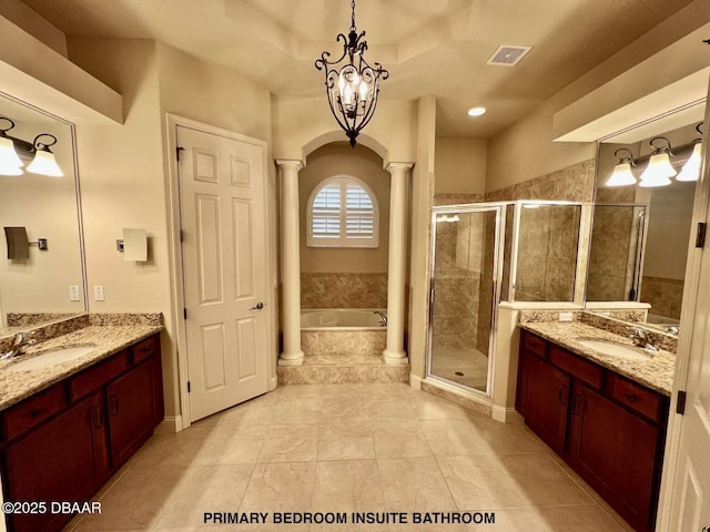 bathroom with vanity, ornate columns, separate shower and tub, and tile patterned flooring