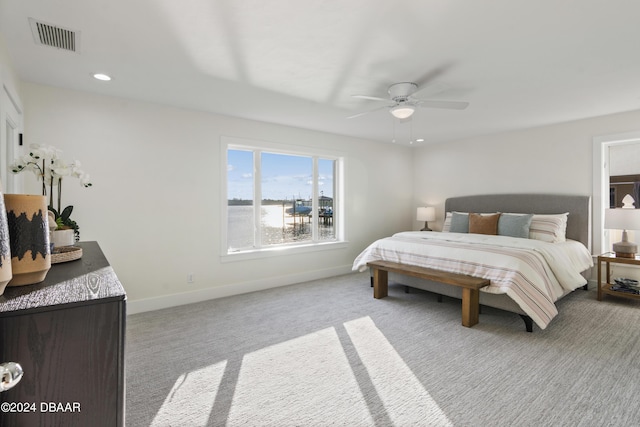 carpeted bedroom with ceiling fan