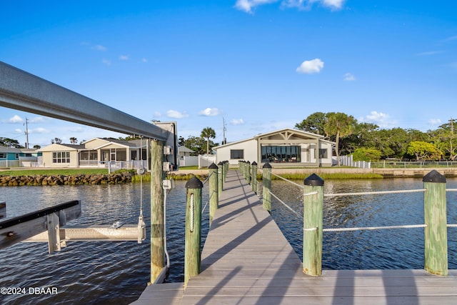 dock area with a water view