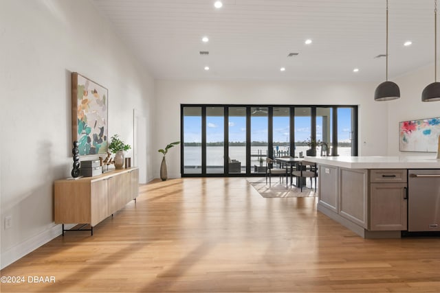 interior space with light hardwood / wood-style flooring and wooden ceiling