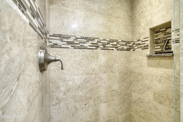 room details with a tile shower