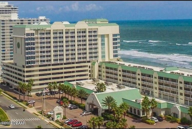 view of building exterior featuring a water view