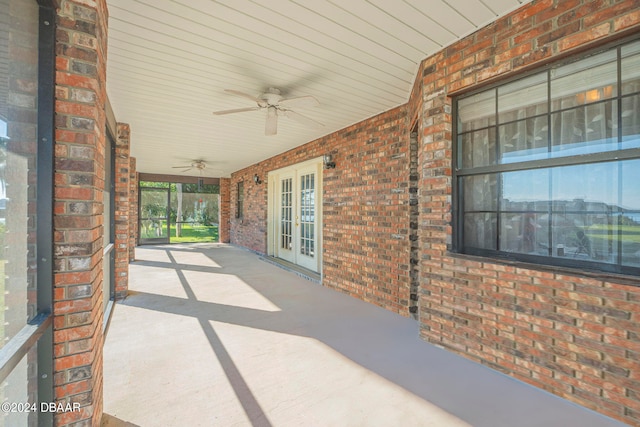 view of patio with french doors and ceiling fan