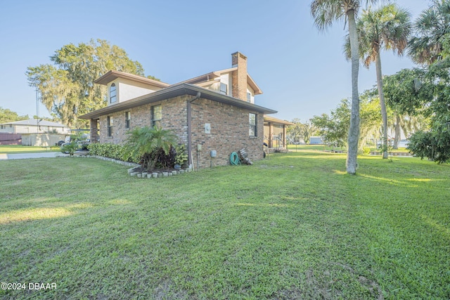 view of property exterior featuring a yard