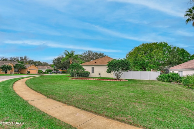 view of yard with fence