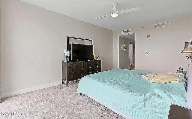 bedroom featuring visible vents, baseboards, and a ceiling fan