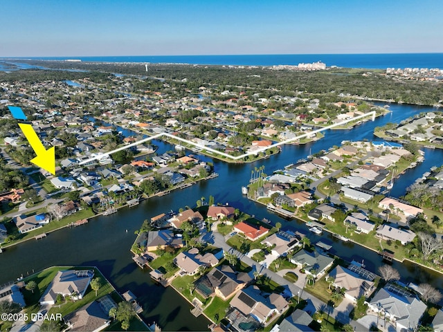 drone / aerial view featuring a water view