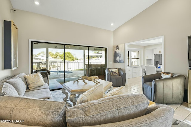 tiled living room with high vaulted ceiling