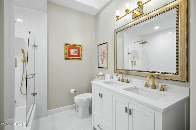 bathroom featuring toilet, tile patterned flooring, vanity, and tiled shower