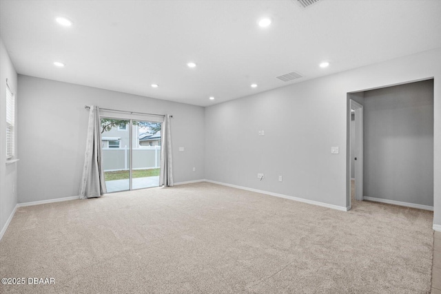 view of carpeted spare room