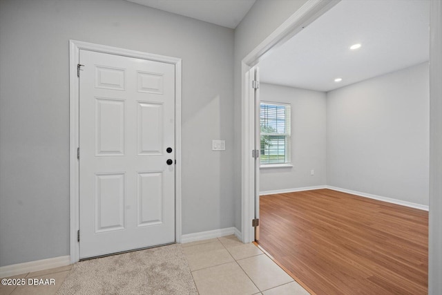 foyer with light tile patterned floors