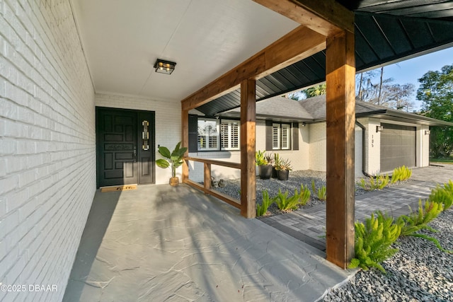 entrance to property featuring a garage