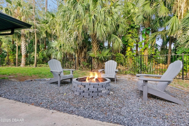 view of patio with a fire pit