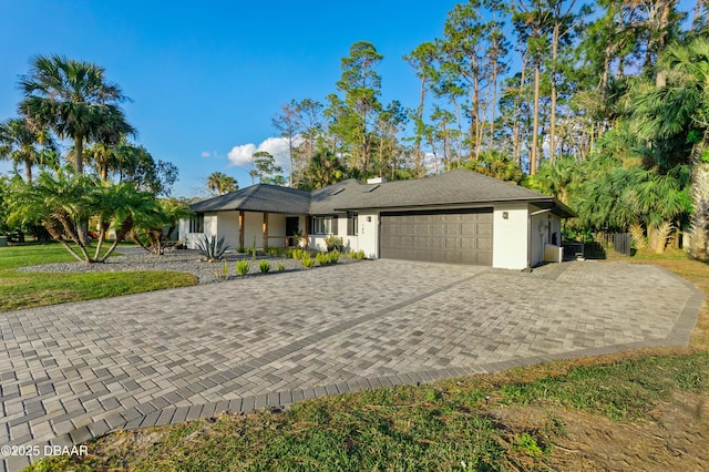 ranch-style home with a garage