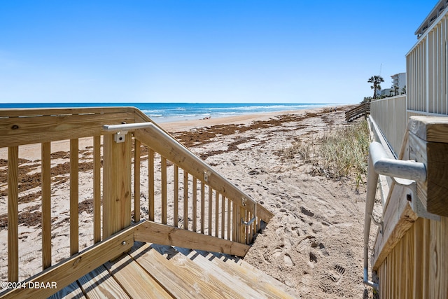 view of water feature with a beach view