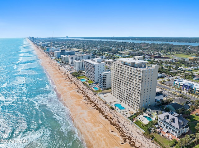 aerial view featuring a view of the beach and a water view