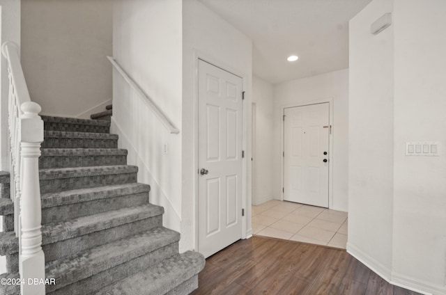 foyer entrance featuring wood-type flooring