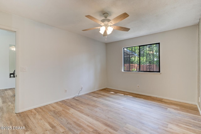 5 Park Pl, Ormond Beach, FL 32174 - empty room with light wood-style flooring and a ceiling fan