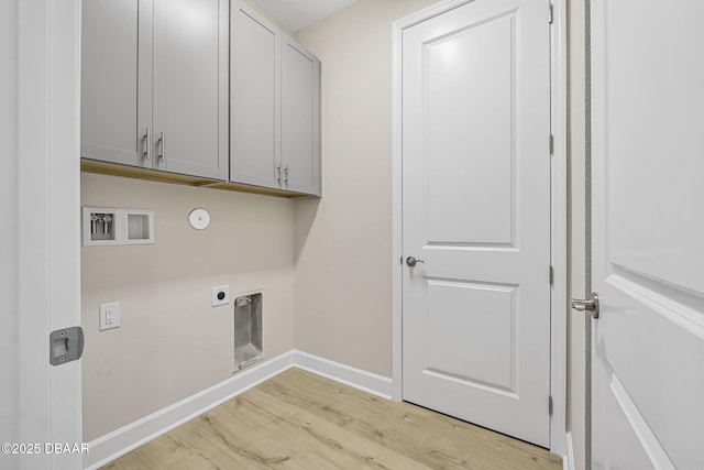 laundry area featuring hookup for an electric dryer, light wood-type flooring, cabinets, hookup for a gas dryer, and washer hookup