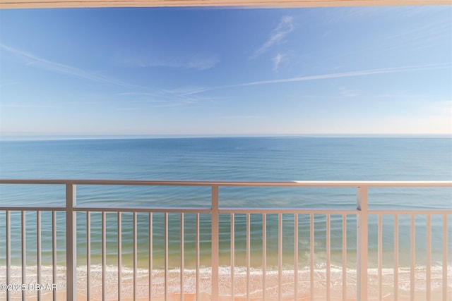 view of water feature with a beach view