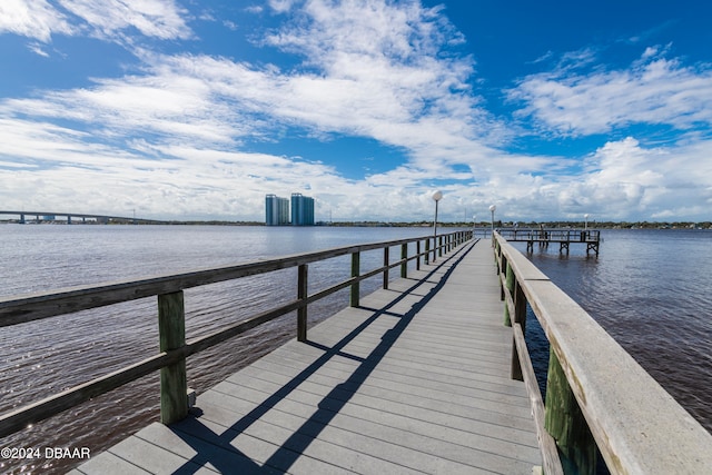 dock area featuring a water view