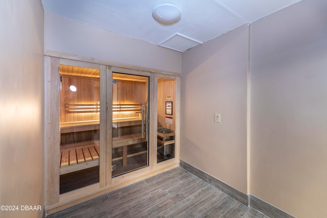 view of sauna featuring hardwood / wood-style floors