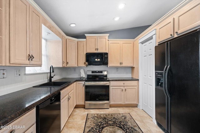 kitchen featuring light tile patterned floors, light brown cabinets, lofted ceiling, black appliances, and sink