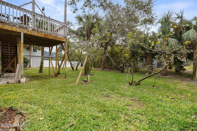 view of yard with a deck