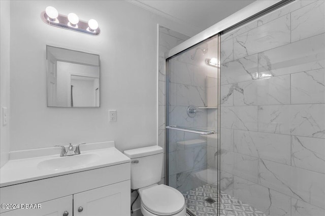 bathroom with ornamental molding, an enclosed shower, vanity, and toilet