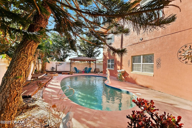 view of pool with a gazebo and a patio