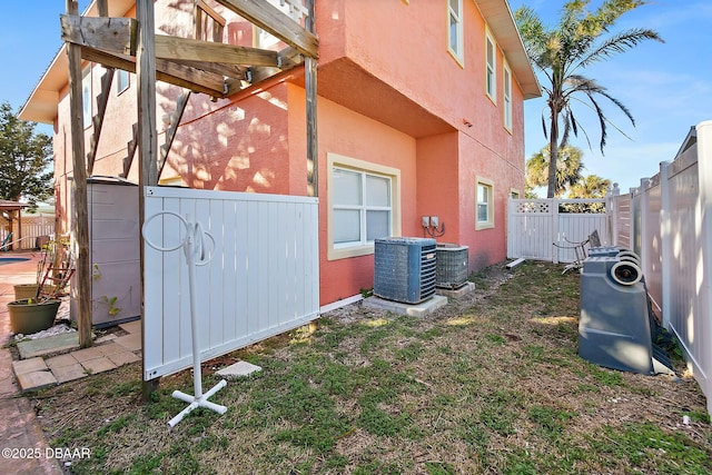 view of property exterior with cooling unit