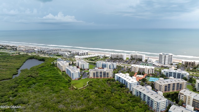 aerial view with a view of the beach and a water view