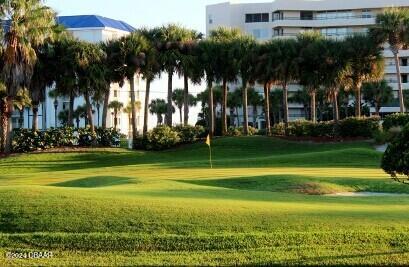 4670 Links Village Dr Unit D204, Ponce Inlet, FL 32127 - surrounding community with a lawn and golf course view