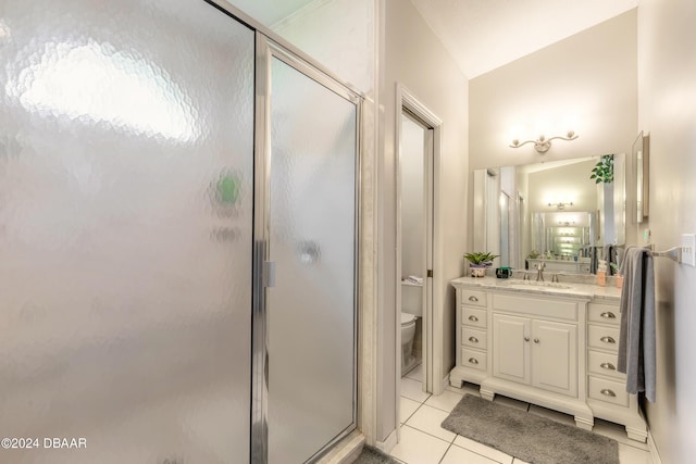 bathroom featuring tile patterned flooring, vanity, an enclosed shower, and lofted ceiling